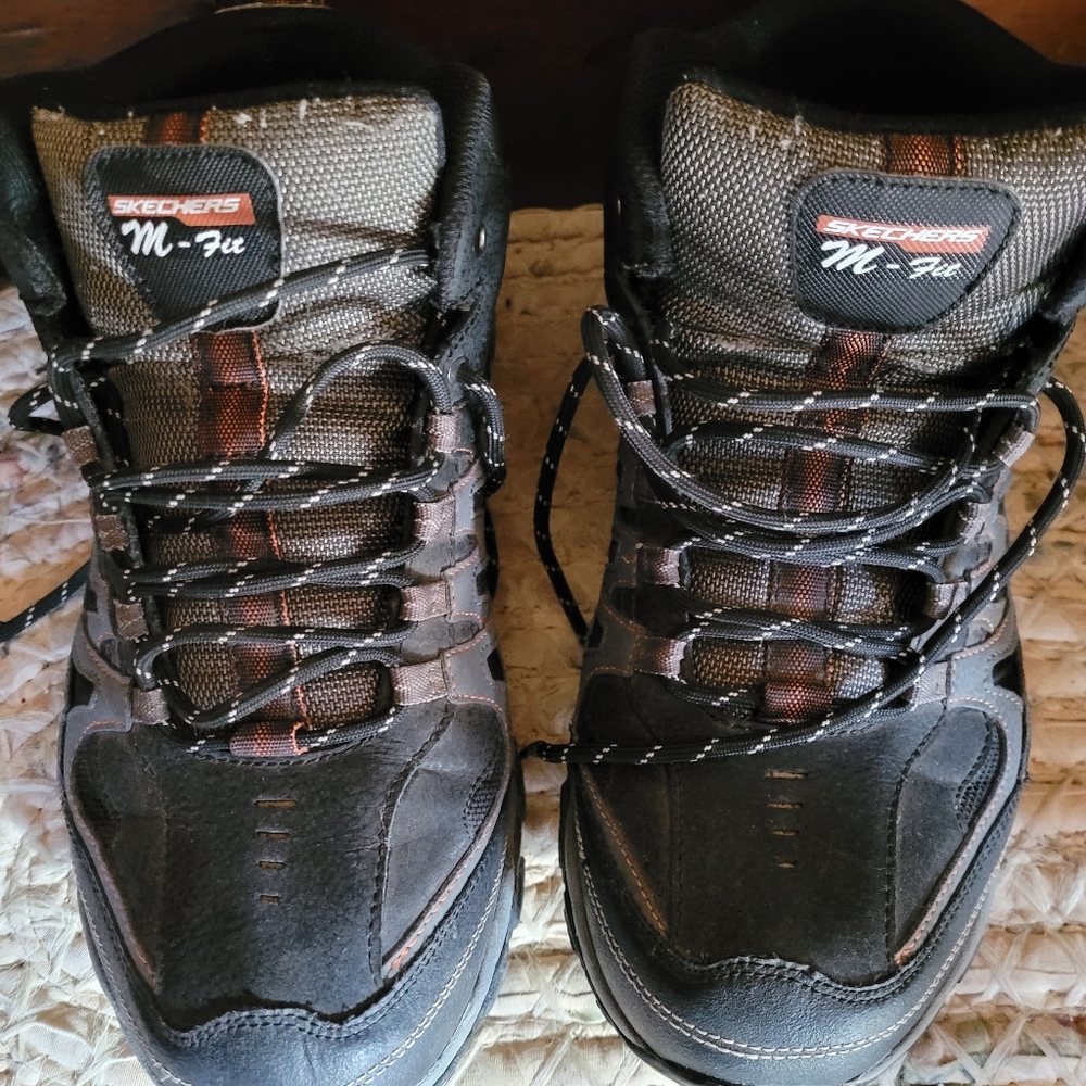 Size 11 Mens high top tennis shoes by skechers (black/Memory Foam)